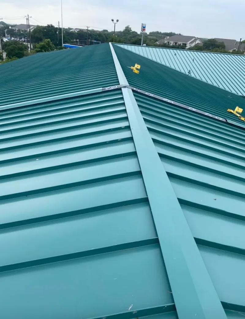 Green commercial metal roof ridge and valley for Metal Roof Repair in Effingham