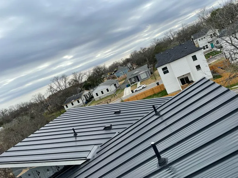 Standing seam metal roof panels with vents for Skylight Repair in Effingham